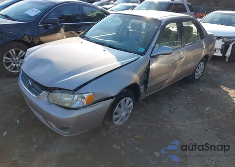 2001 Toyota Corolla Le from USA, damaged, VIN 2T1BR12E41C428657